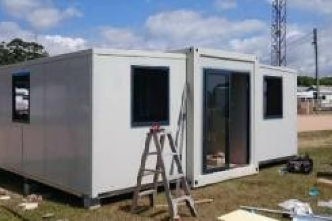 Quick-install heat-insulated double-wing folding extension house