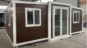 Insulated double-wing folding expansion home-7